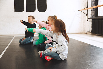 Image showing The kids at dance school. Ballet, hiphop, street, funky and modern dancers