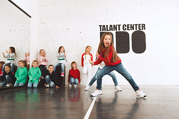 Image showing The kids at dance school. Ballet, hiphop, street, funky and modern dancers