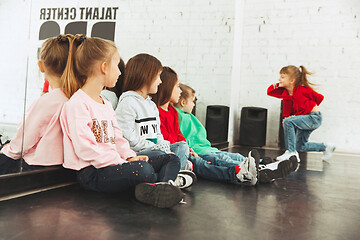 Image showing The kids at dance school. Ballet, hiphop, street, funky and modern dancers