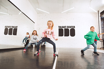 Image showing The kids at dance school. Ballet, hiphop, street, funky and modern dancers