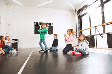 Image showing The kids at dance school. Ballet, hiphop, street, funky and modern dancers