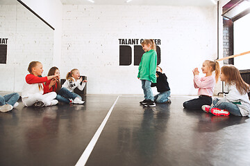 Image showing The kids at dance school. Ballet, hiphop, street, funky and modern dancers