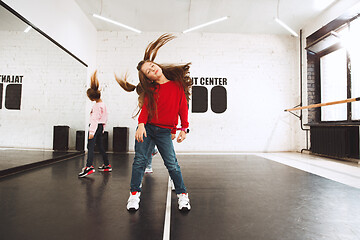 Image showing The kids at dance school. Ballet, hiphop, street, funky and modern dancers