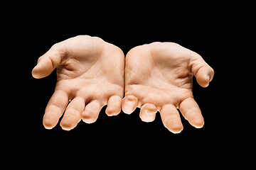 Image showing Male hands demonstrating a gesture of getting touch isolated on gray background