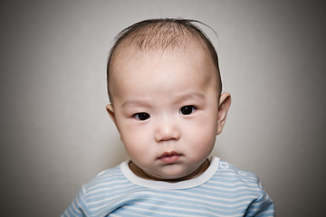 Image showing Asian baby staring