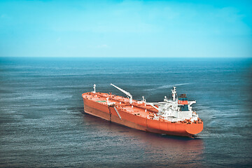 Image showing Red oil tanker or cargo ship on the sea