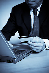 Image showing Senior businessman shopping online