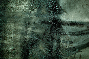 Image showing Grungy dark cement wall background texture