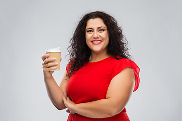 Image showing woman in red dress holding takeaway coffee cup