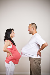 Image showing Happy expecting pregnant asian couple