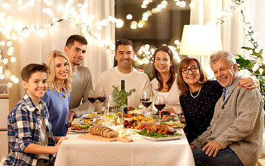 Image showing happy family having dinner party at home