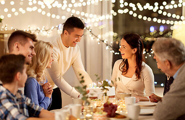 Image showing happy family having birthday party at home