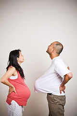 Image showing Happy expecting pregnant asian couple