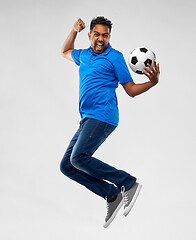 Image showing man or football fan with soccer ball jumping