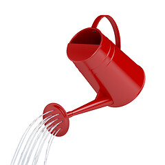 Image showing Pouring water from a red watering can