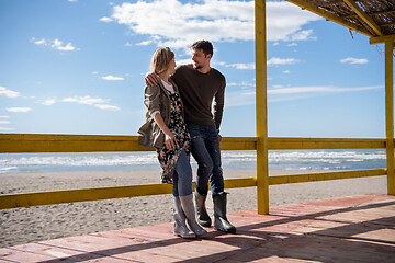 Image showing Couple chating and having fun at beach bar