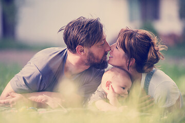 Image showing hipster family relaxing in park