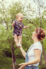 Image showing woman with baby  in nature