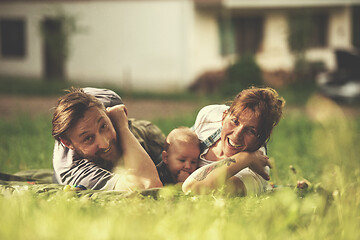 Image showing hipster family relaxing in park