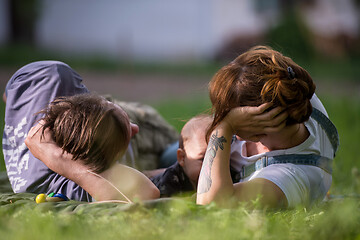 Image showing hipster family relaxing in park