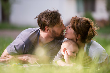 Image showing hipster family relaxing in park