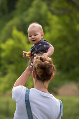 Image showing woman with baby  in nature