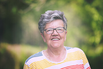 Image showing happy  senior woman with eyeglasses