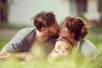 Image showing hipster family relaxing in park
