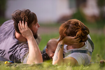 Image showing hipster family relaxing in park