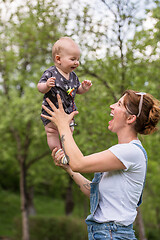 Image showing woman with baby  in nature