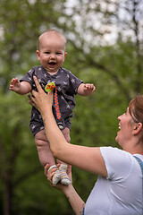 Image showing woman with baby  in nature