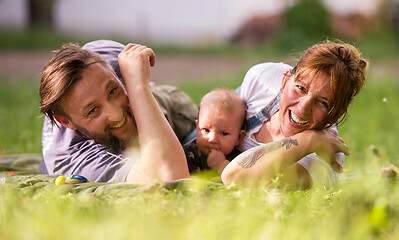 Image showing hipster family relaxing in park