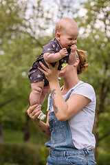 Image showing woman with baby  in nature