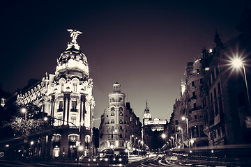 Image showing Rays of traffic lights on Gran via street, main shopping street in Madrid at night. Spain, Europe