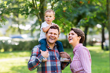 Image showing happy family having fun at summer park