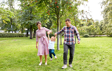 Image showing happy family having fun at summer park