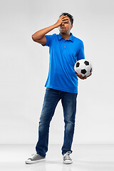 Image showing upset indian male football fan with soccer ball