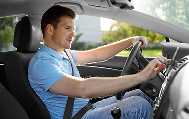 Image showing man or driver driving car and using gps navigator