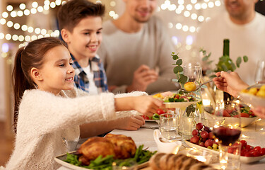 Image showing happy family having dinner party at home