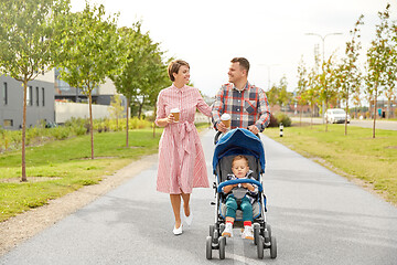 Image showing family with baby in stroller and coffee in city