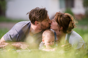 Image showing hipster family relaxing in park