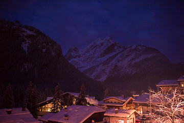 Image showing mountain village in alps  at night