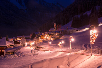 Image showing mountain village in alps  at night