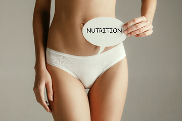 Image showing Women belly with the drawing word NUTRITION.