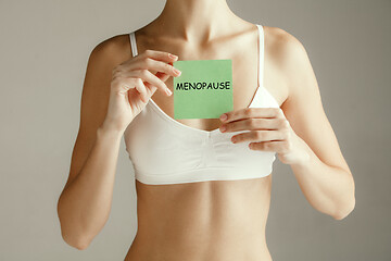 Image showing Handwriting text writing Menopause. Concept meaning Cessation of menstruation