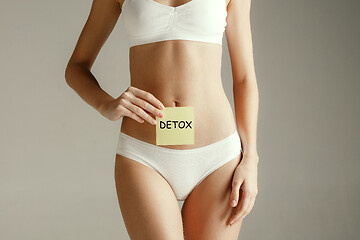 Image showing Women belly with drawing word DETOX