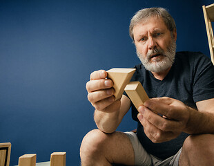 Image showing Old bearded man with alzheimer desease