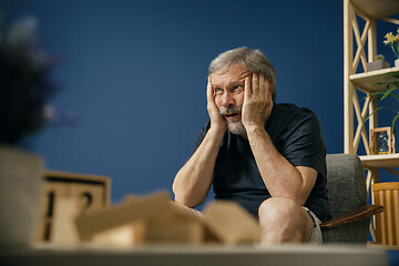 Image showing Old bearded man with alzheimer desease