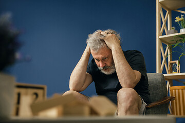 Image showing Old bearded man with alzheimer desease