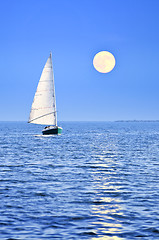 Image showing Sailboat at full moon